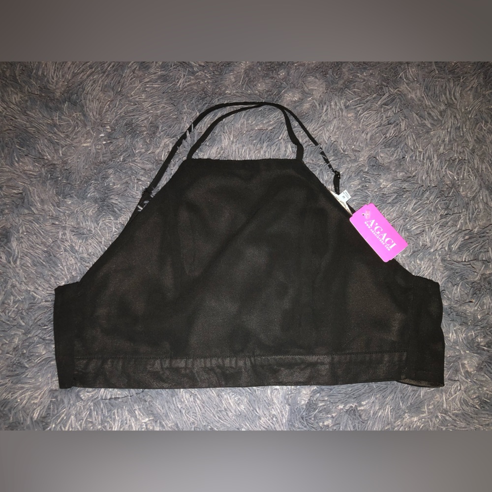 Black halter top with a crossed design on the back and adjustable bow